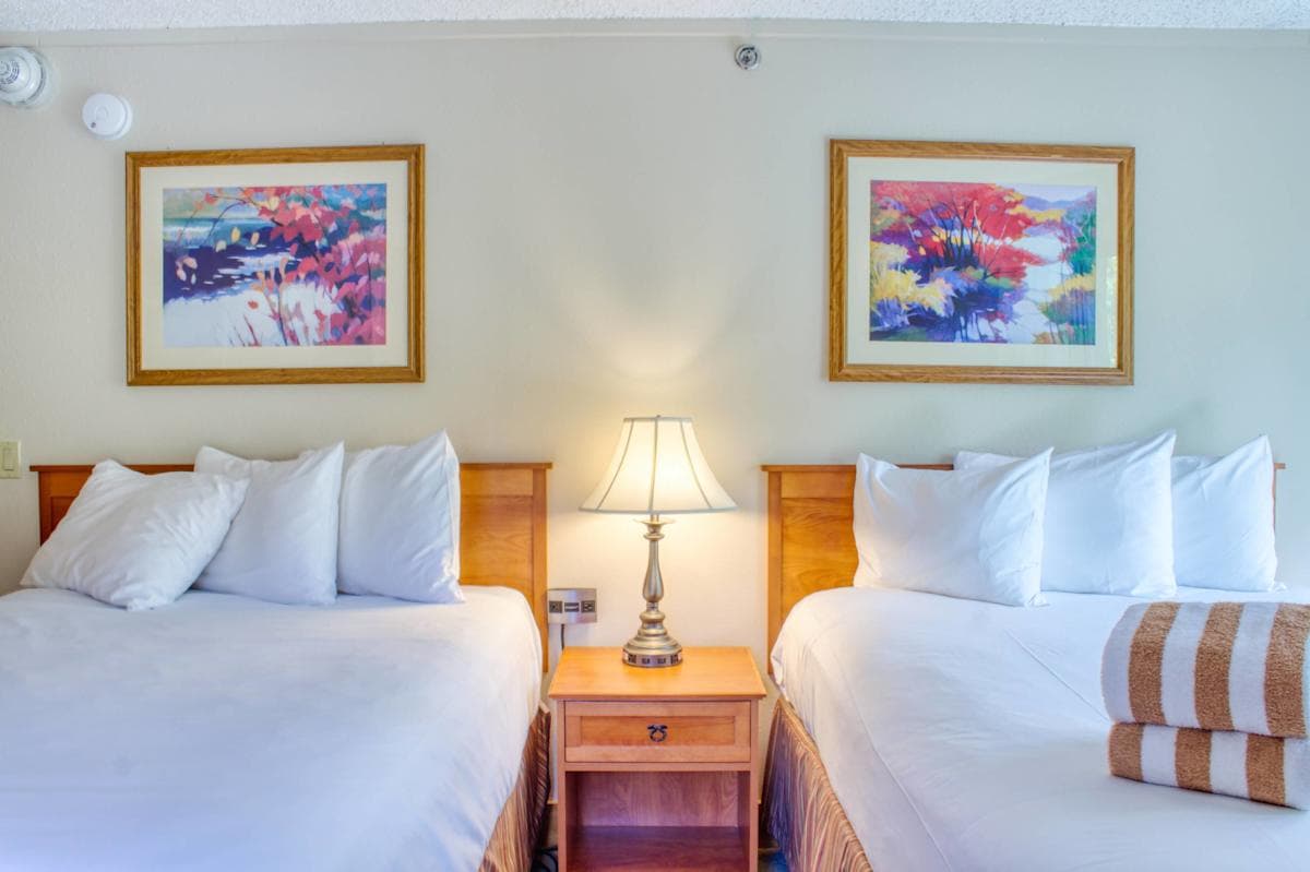 Separate Bedroom with 2 Queen Beds | Listed with @BookTraverse