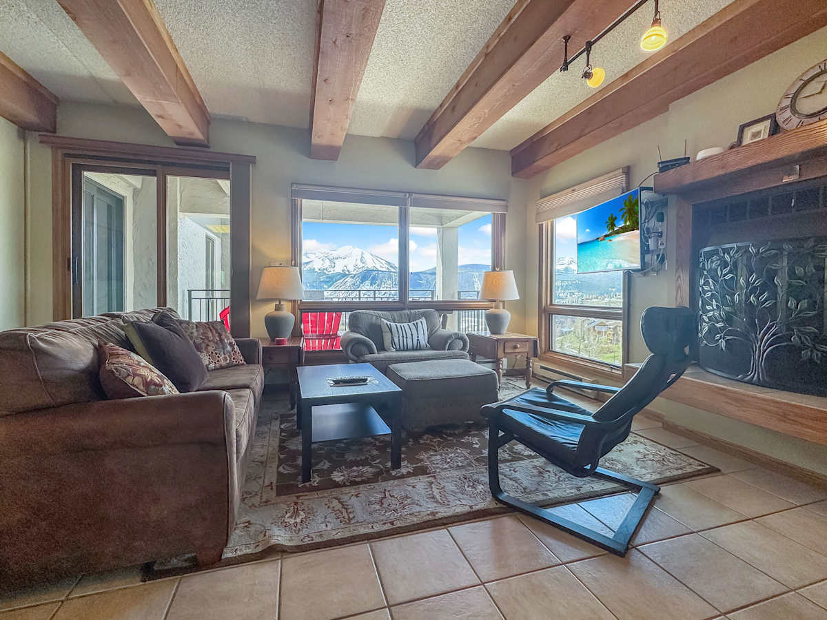 Wood Burning Fireplace with a mountain view | Listed with @BookTraverse