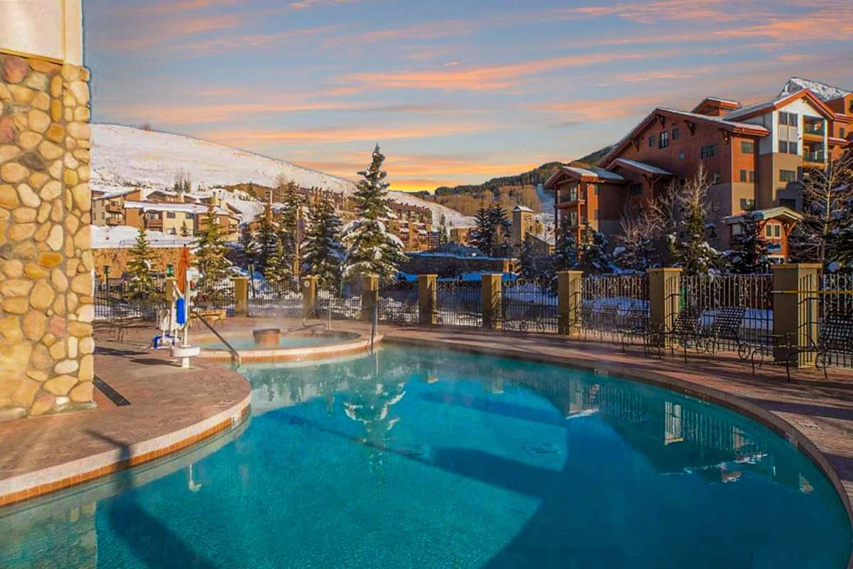 【Pool & Hot Tub】Dusk over the heated pool — your soak after a day on Red Lady