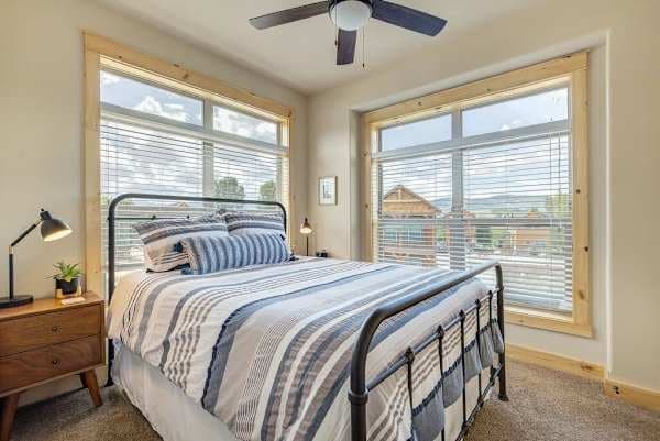 【Bedroom 2】Queen bed with water views the moment you wake up