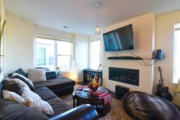 【Living Room】 Fireplace to your left, private entrance just behind you