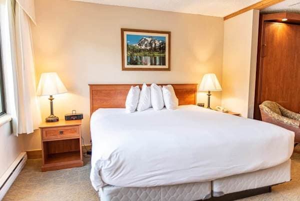【Bedroom】King bed steps from the lifts — guests call it comfy