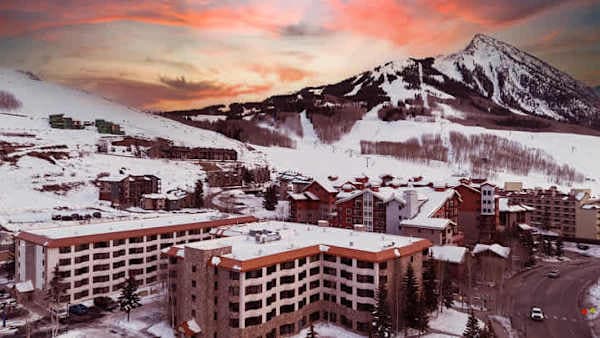 【Grand Lodge】Alpenglow over the slopes — ski season runs Nov–Apr
