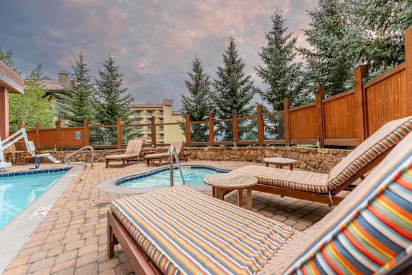 Hot tub, on the fitness level floor | Listed with @BookTraverse