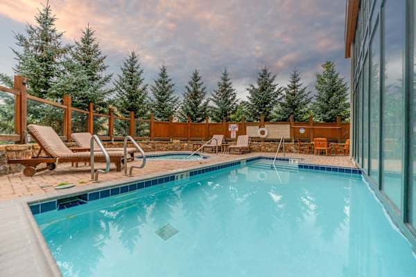 Heated indoor/outdoor pool and hot tub open year round | Listed with @BookTraverse