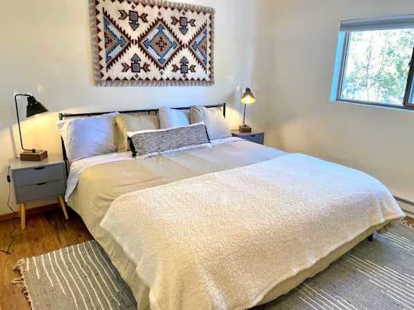 【Primary Bedroom】 King bed with brand-new mattress — downstairs for easy access