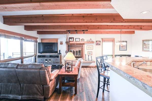 【Fireplace + TV】Woodburning hearth next to the smart TV — seasonal firewood provided