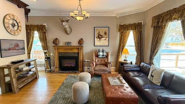 【Main Living Room】Original 1893 fireplace — the whole-crew gathering spot