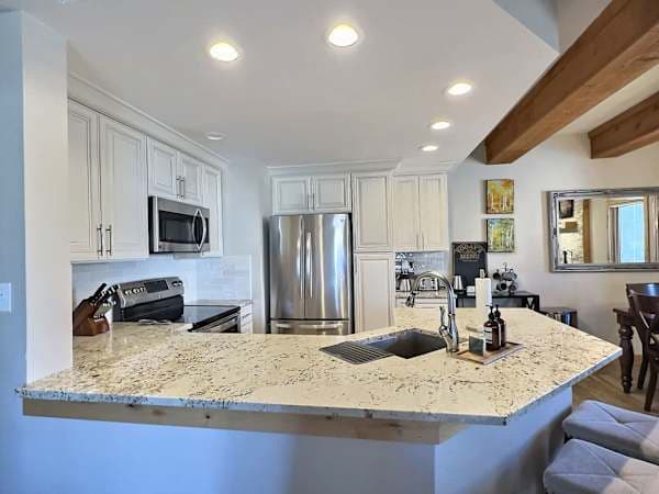 Renovated modern and well stocked kitchen | Listed with @BookTraverse