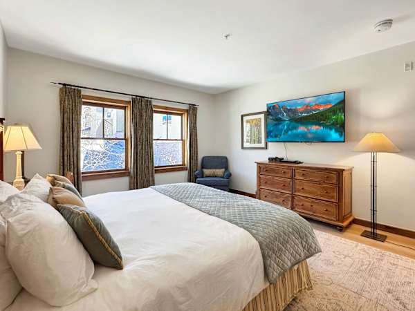 Comfortable bed and Smart TV for Streaming your favorites | Listed with @BookTraverse